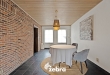 Licht op te frissen woning op een ruim perceel te centrum Roeselare!
