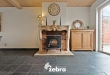Licht op te frissen woning op een ruim perceel te centrum Roeselare!