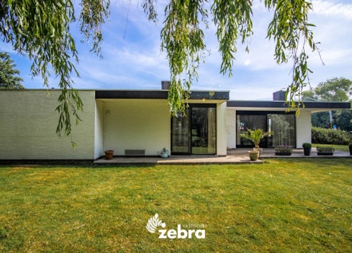Vrijstaande bungalow met zuidgerichte tuin en prachtig zicht in centrum Tielt!