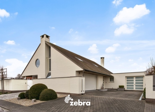 Tijdloze villa op een perceel van 2477 m² te Wevelgem!