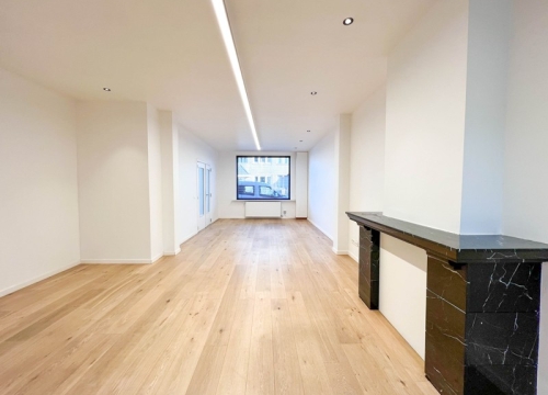 Instapklare woning met commerciële ruimte, tuin & garage te centrum Tielt!