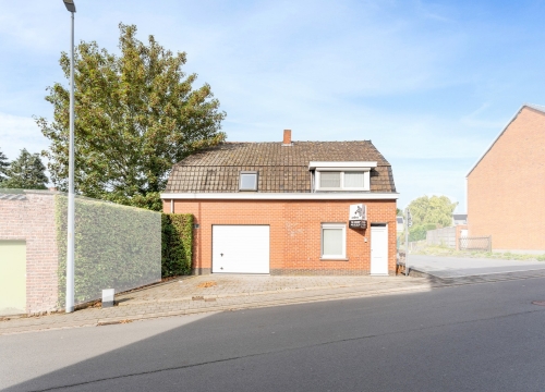 Instapklare woning met 2 slaapkamers, gezellige tuin & garage nabij het centrum van Tielt!