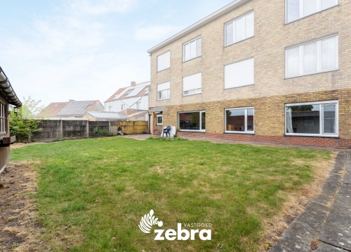 Gelijkvloers appartement met drie slaapkamers, tuin en garage te Tielt!