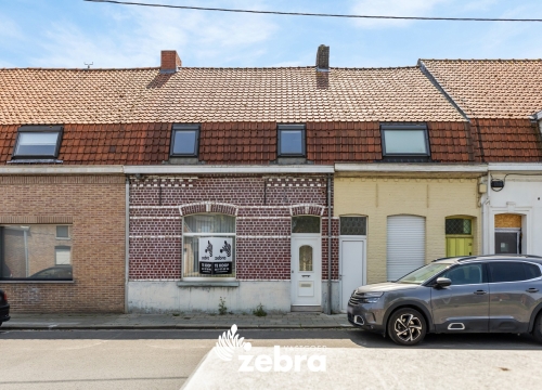 Te renoveren woning met stadskoer in centrum Tielt!