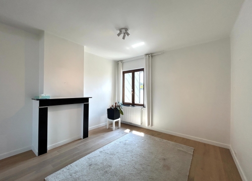 Instapklare woning met commerciële ruimte, tuin & garage te centrum Tielt!