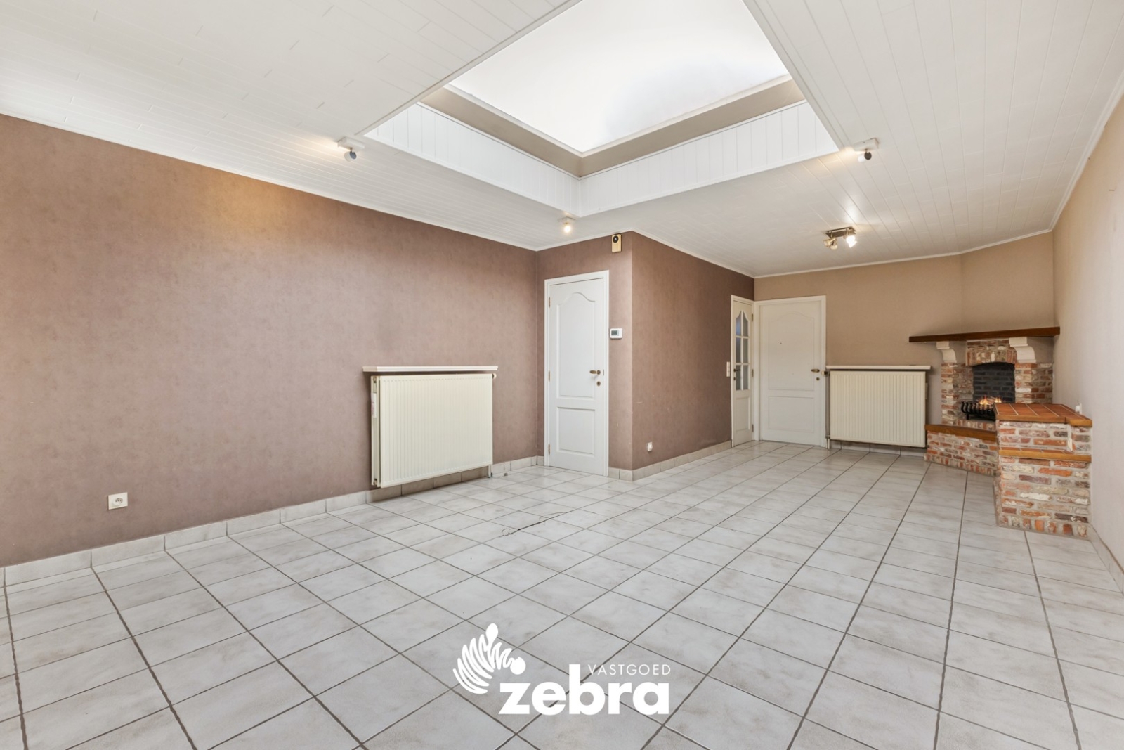 Instapklare gezinswoning met 3 slaapkamers en uitweg op toplocatie te Rumbeke (Roeselare)!